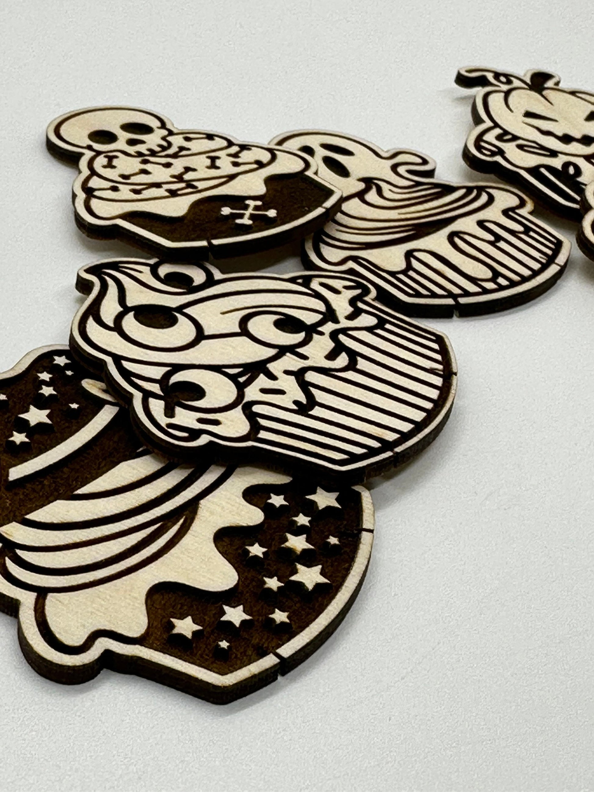 Wooden cutouts with skull  design on a white background