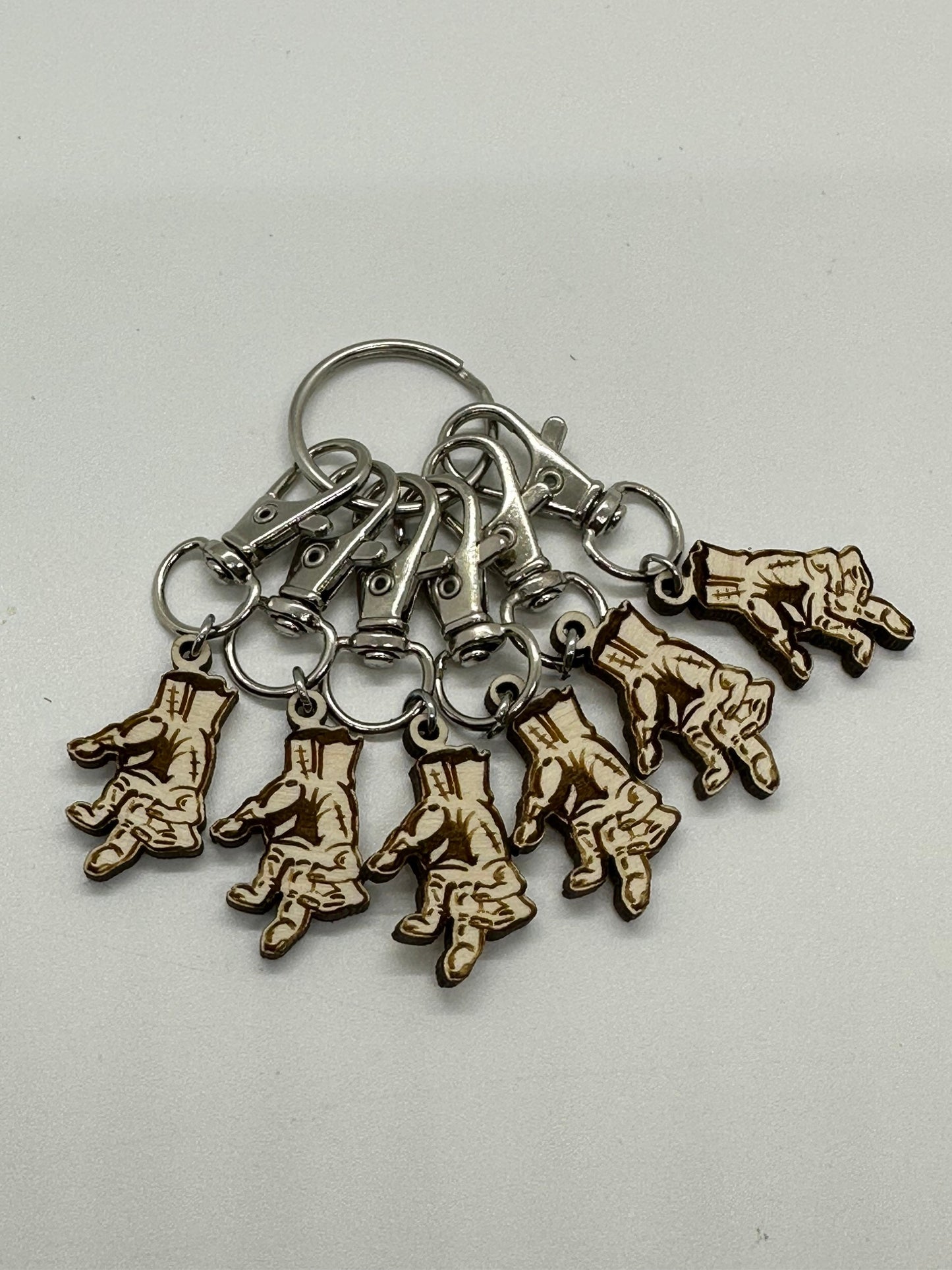 Keychain with hand  charms on a white background