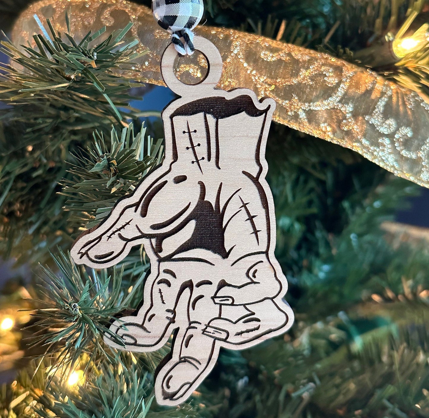 Decorative hand ornament on a Christmas tree