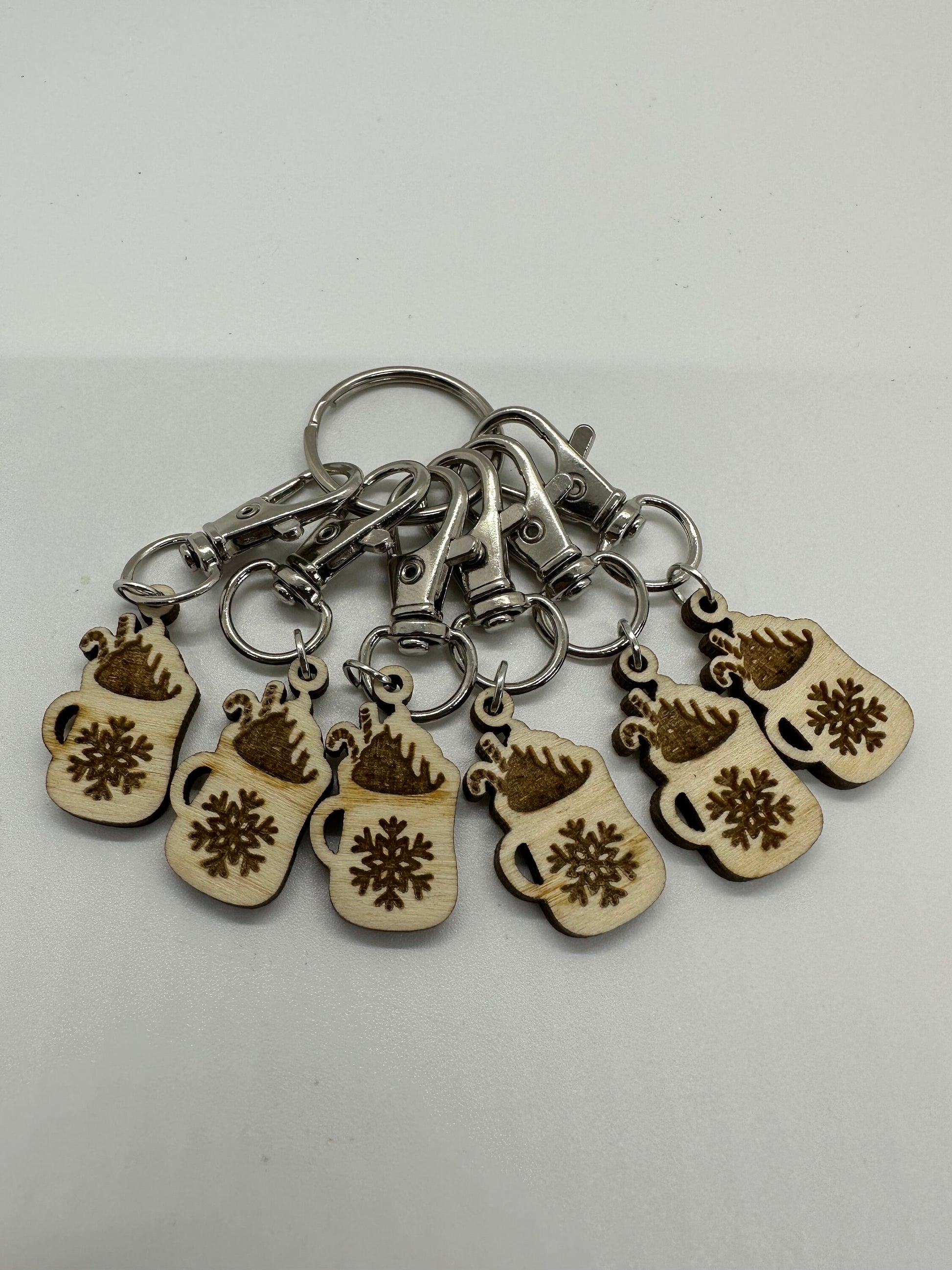 Keychain with wooden mug charms on a white background