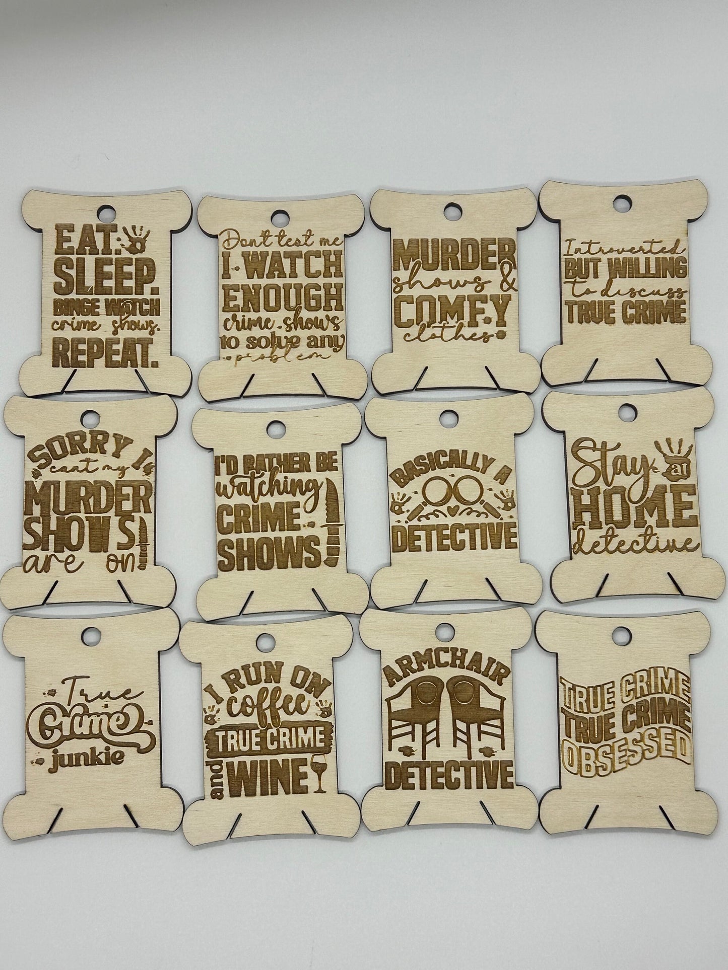 Set of wooden tags with humorous text designs on a white background